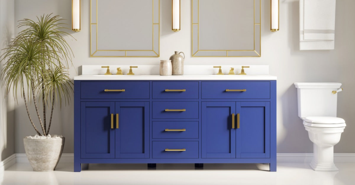 A dark blue bathroom vanity in a residential bathroom. Two tall mirrors sit on the wall above the vanity.