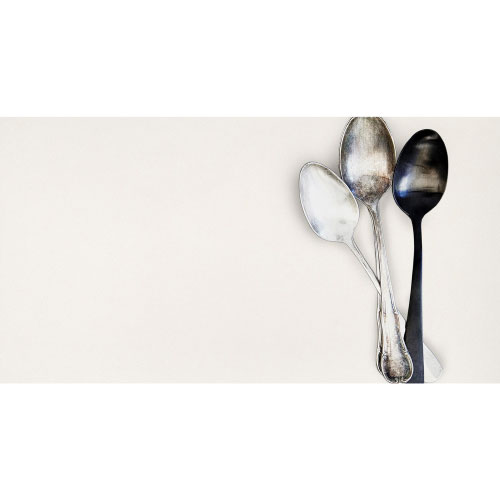spoons on top of snow white quartz countertop